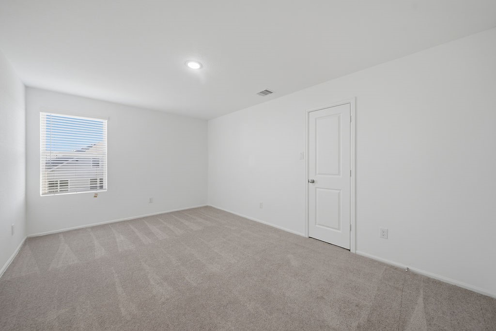 14230 Overbrook Willow Way Rosharon, TX 77583 - Photo 33 of 50 a view of an empty room with a window