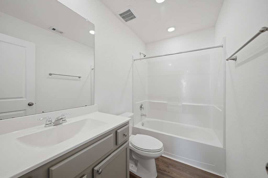 14230 Overbrook Willow Way Rosharon, TX 77583 - Photo 39 of 50 a bathroom with a sink toilet and shower