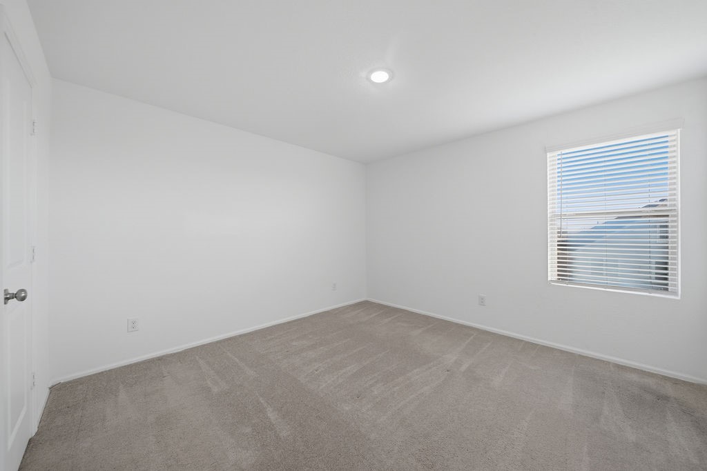 14230 Overbrook Willow Way Rosharon, TX 77583 - Photo 40 of 50 an empty room with a window