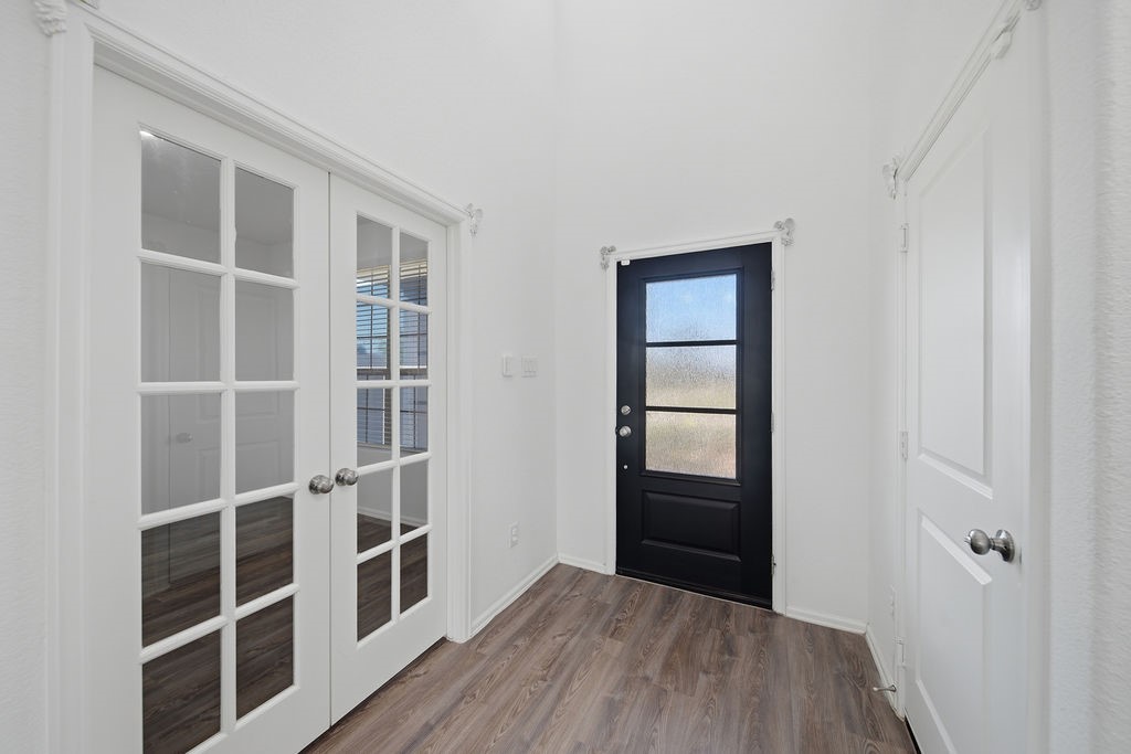 14230 Overbrook Willow Way Rosharon, TX 77583 - Photo 5 of 50 a view of walk in closet with empty racks