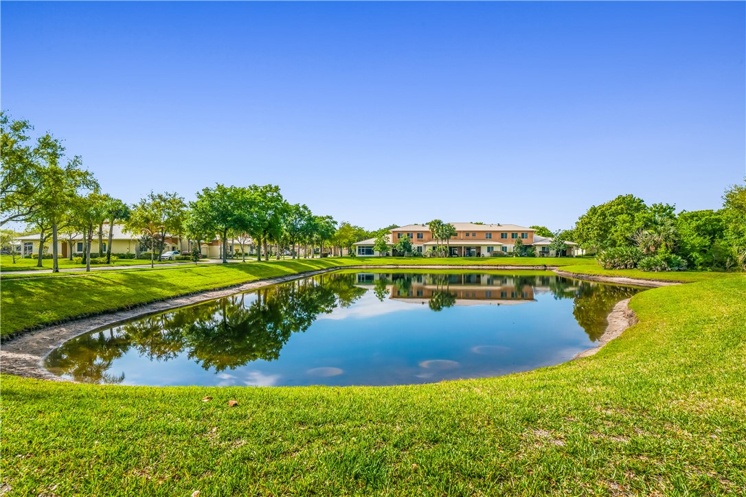 2522 Stockbridge Square Southwest Vero Beach, FL 32962 - Photo 18 of 34 a view of a lake with a big yard