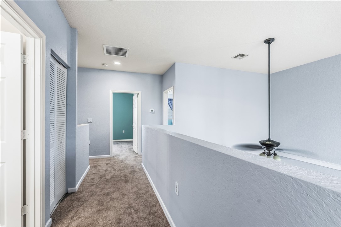 2522 Stockbridge Square Southwest Vero Beach, FL 32962 - Photo 19 of 34 a view of a hallway with closet