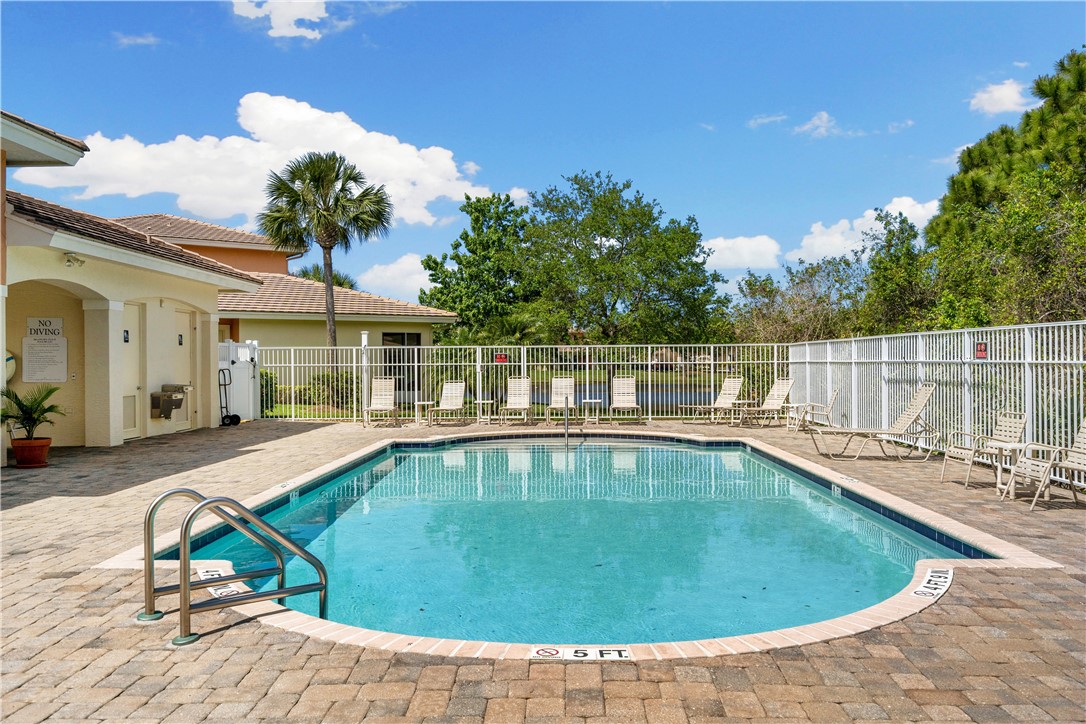 2522 Stockbridge Square Southwest Vero Beach, FL 32962 - Photo 34 of 34 a view of a house with swimming pool