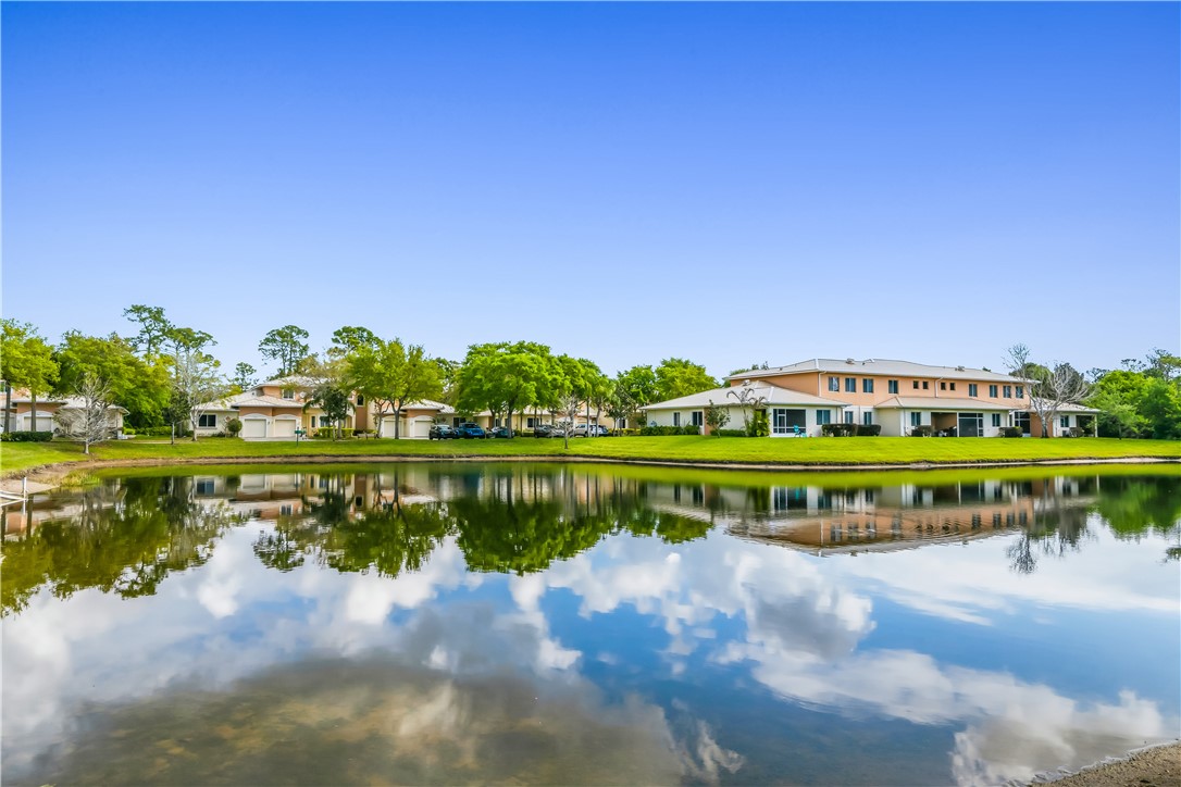 2522 Stockbridge Square Southwest Vero Beach, FL 32962 - Photo 5 of 34 a view of building with river in front of it