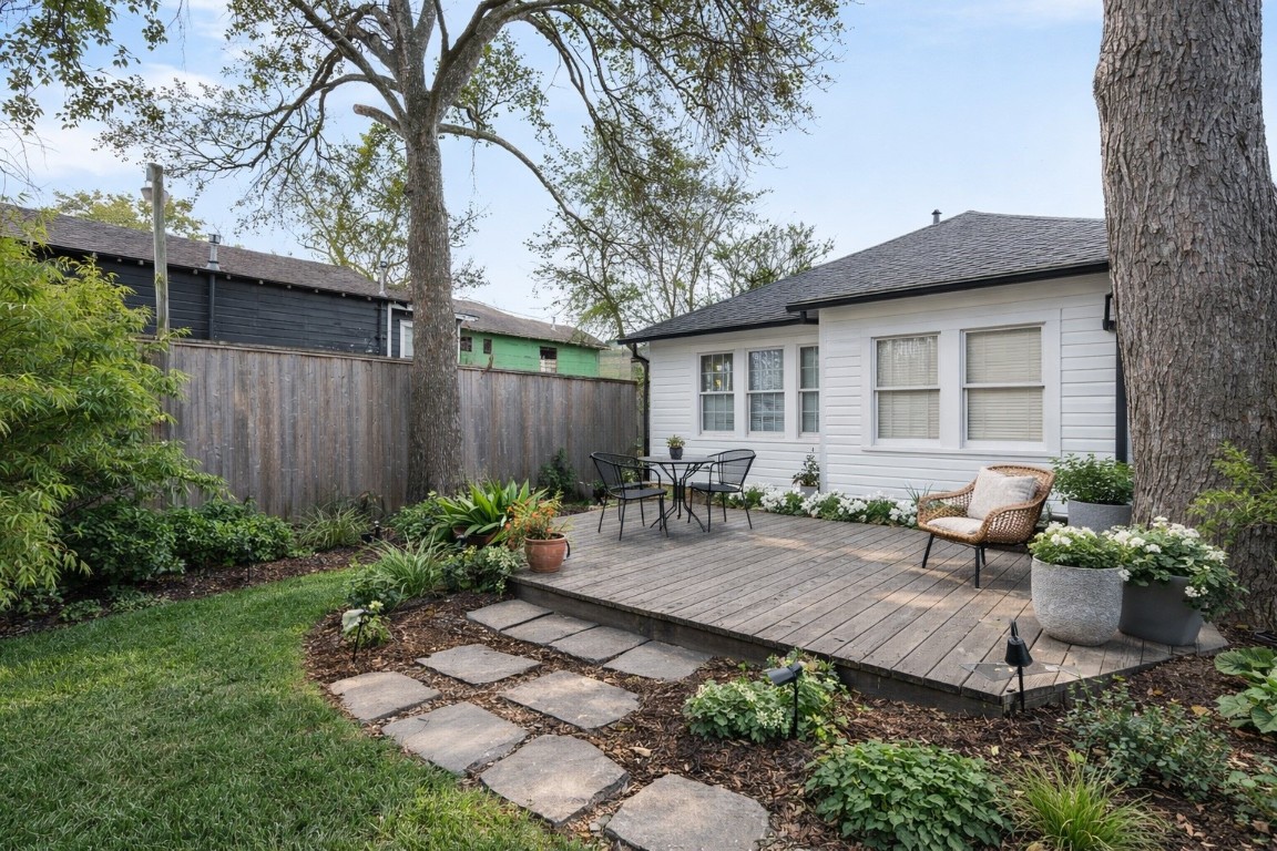 1004 Missouri Street Houston, TX 77006 - Photo 19 of 22 a front view of a house with garden and sitting area