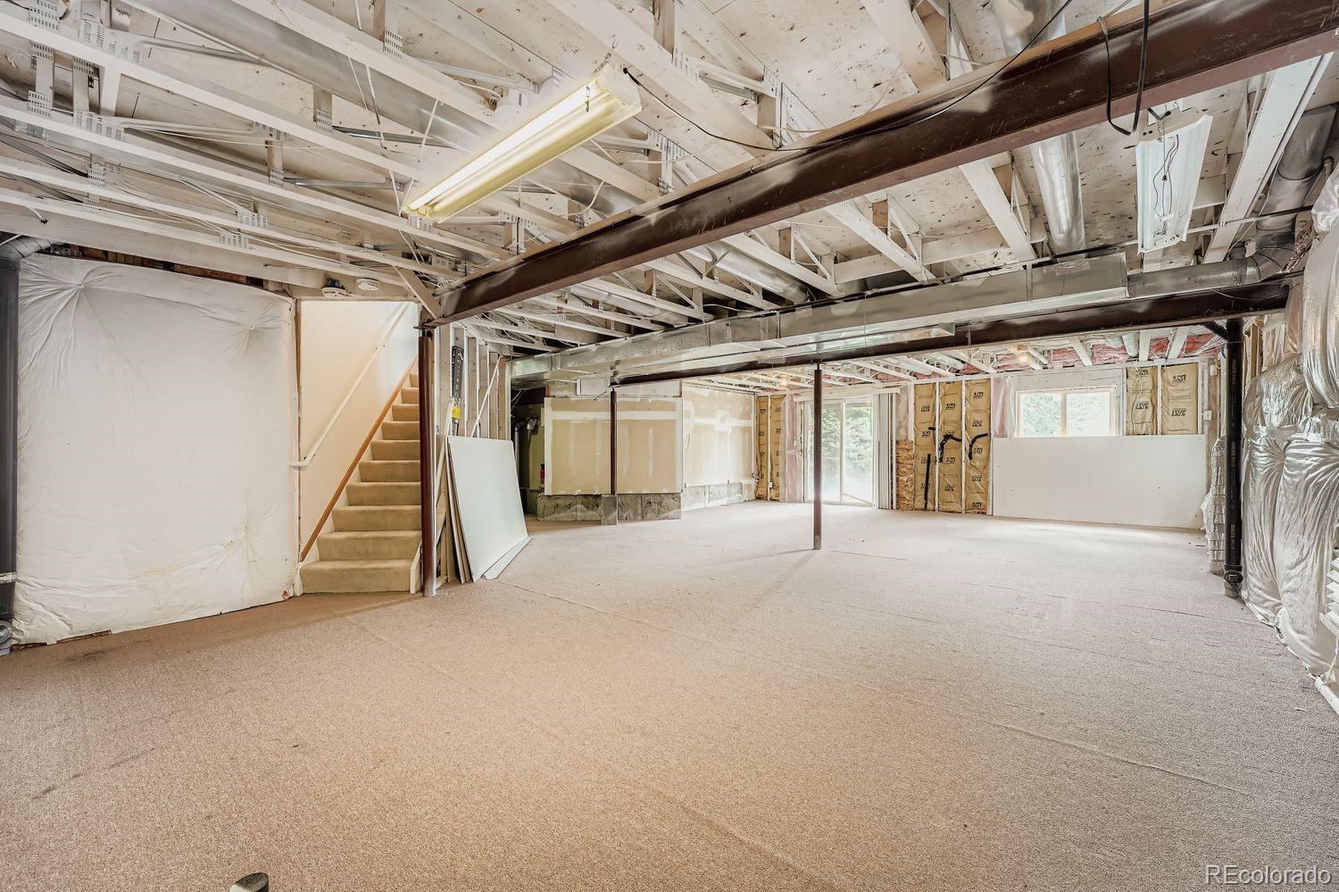 20758 East Maplewood Lane Centennial, CO 80016 - Photo 22 of 29 a view of an empty room with a window