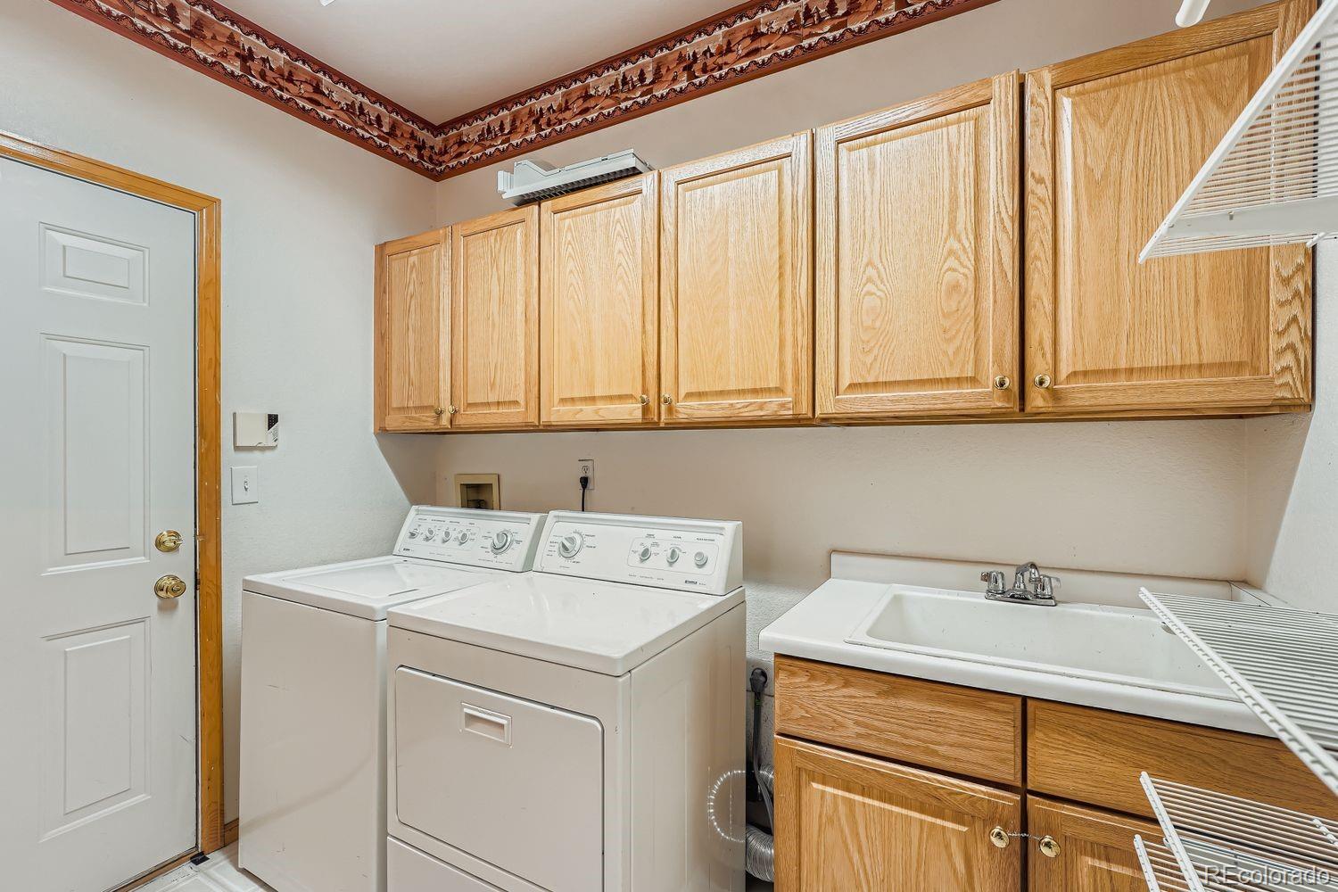 20758 East Maplewood Lane Centennial, CO 80016 - Photo 23 of 29 a utility room with dryer and washer