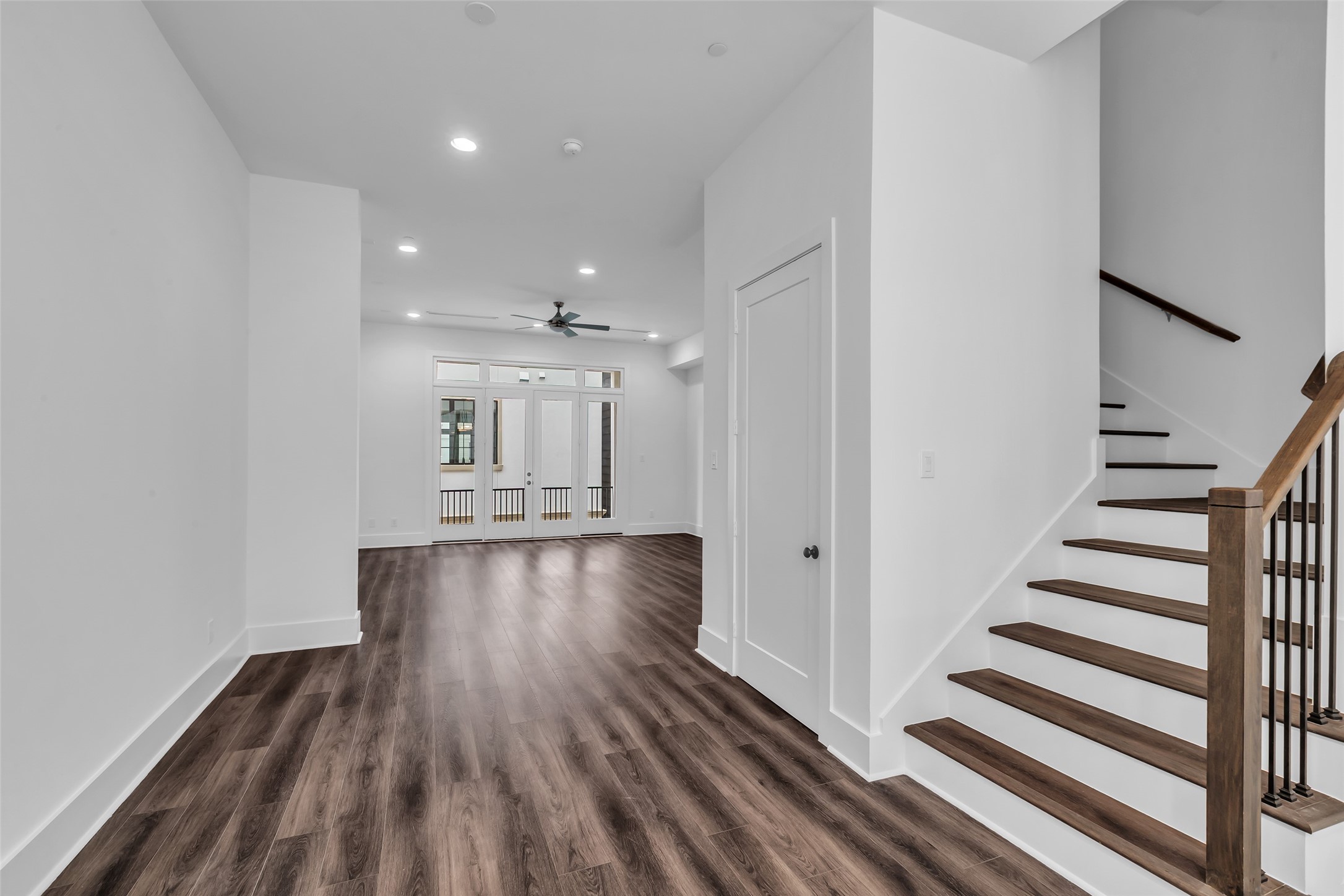 2716 Baldwin Street Houston, TX 77006 - Photo 12 of 26 This view from the kitchen highlights the open layout, giving a clear look into the connected living and dining spaces.