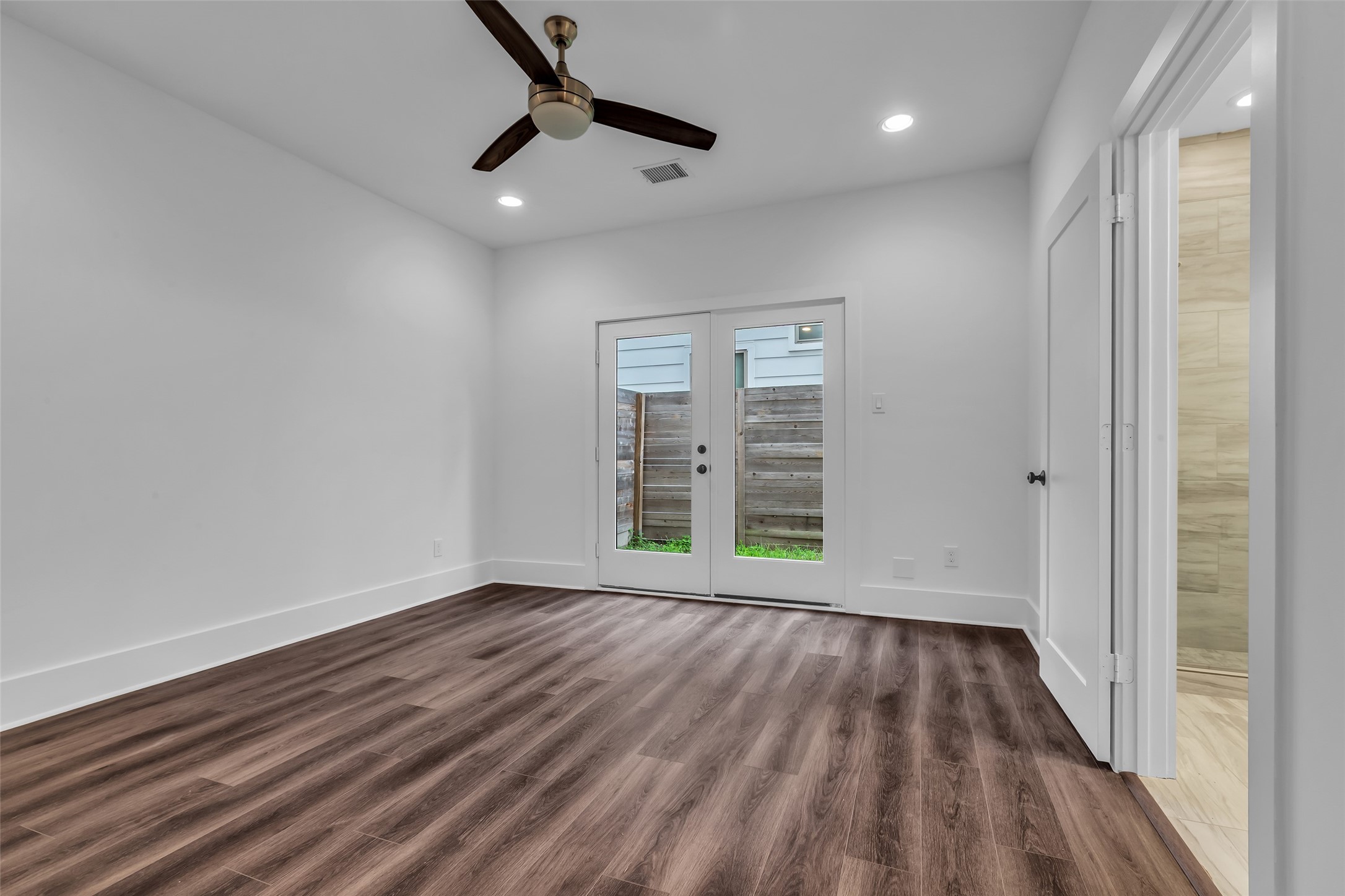 2716 Baldwin Street Houston, TX 77006 - Photo 2 of 26 This flexible first-floor room can easily be used as a home office, guest bedroom, or hobby space to suit your needs.