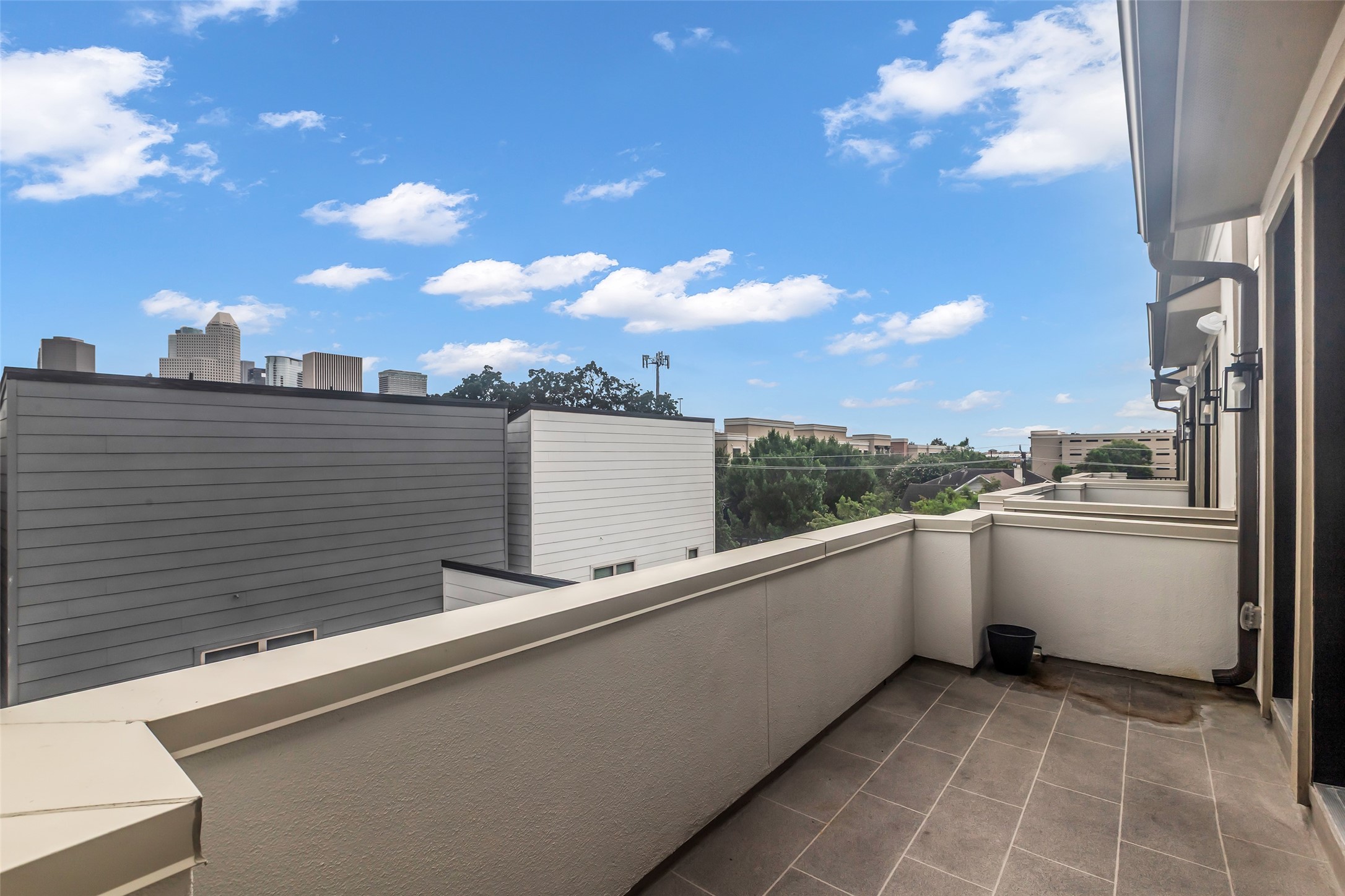 2716 Baldwin Street Houston, TX 77006 - Photo 24 of 26 This is the balcony on the fourth floor, providing an elevated view of the surrounding neighborhood.