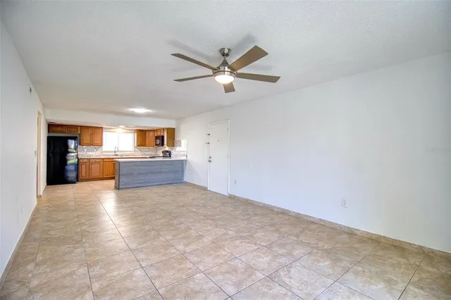 a view of a kitchen with a sink and a cabinets