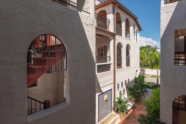 a view of a brick house with a small entryway