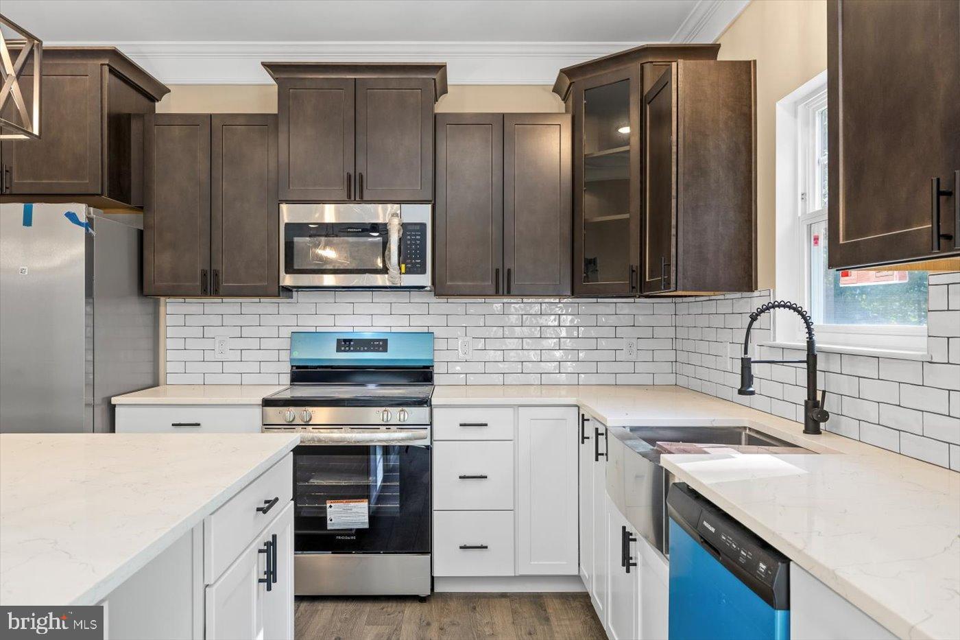 9019 Smiths Bend Road Fredericksburg, VA 22407 - Photo 13 of 57 a kitchen with a sink stove and refrigerator