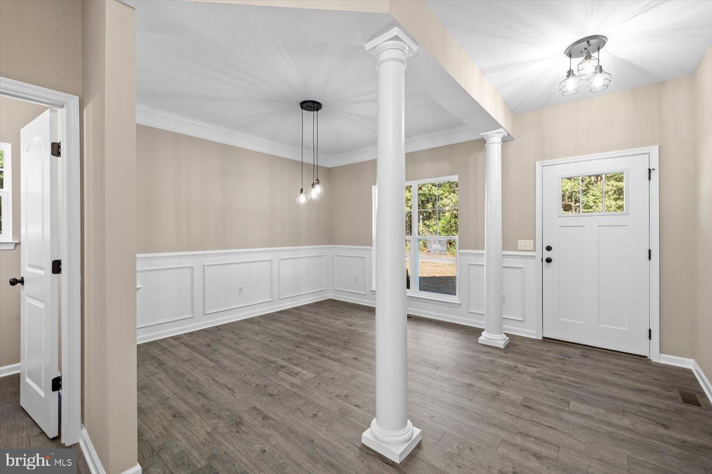 9019 Smiths Bend Road Fredericksburg, VA 22407 - Photo 18 of 57 wooden floor in an empty room with a window