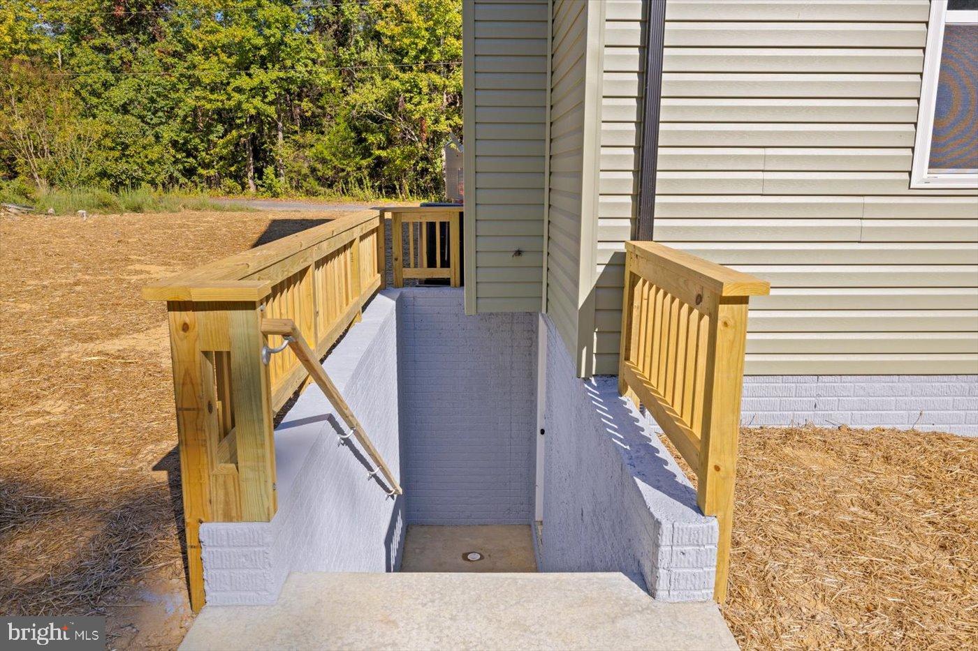 9019 Smiths Bend Road Fredericksburg, VA 22407 - Photo 56 of 57 a view of balcony with wooden floor and fence
