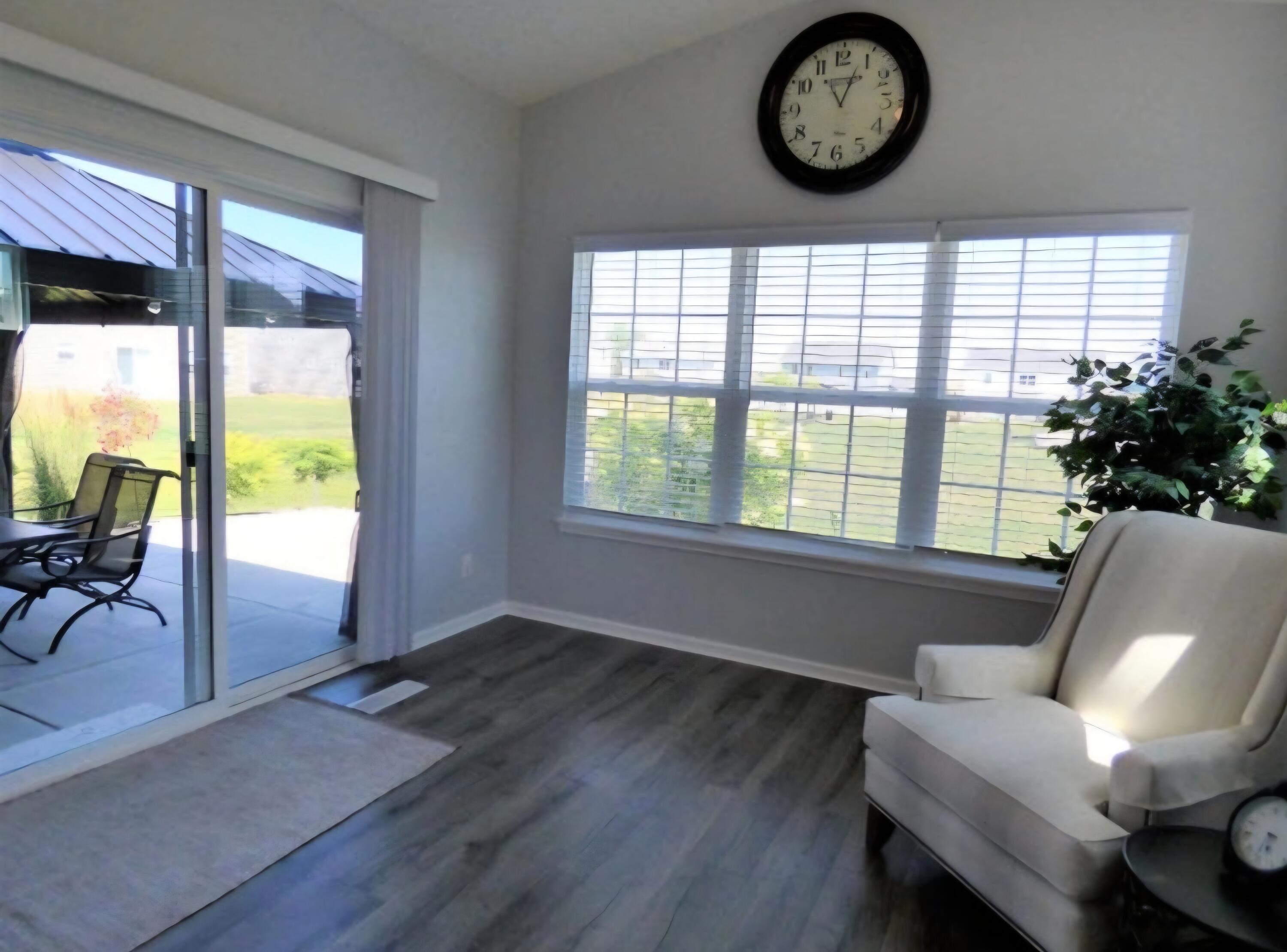 636 East 119th Place Crown Point, IN 46307 - Photo 12 of 35 a living room with furniture and a large window