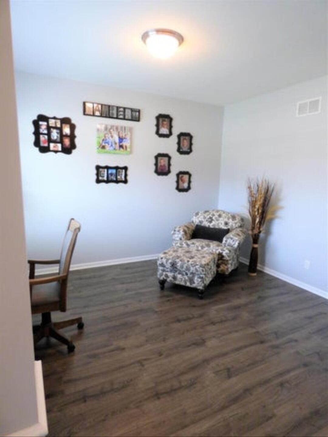 636 East 119th Place Crown Point, IN 46307 - Photo 2 of 35 a living room with furniture and wooden floor