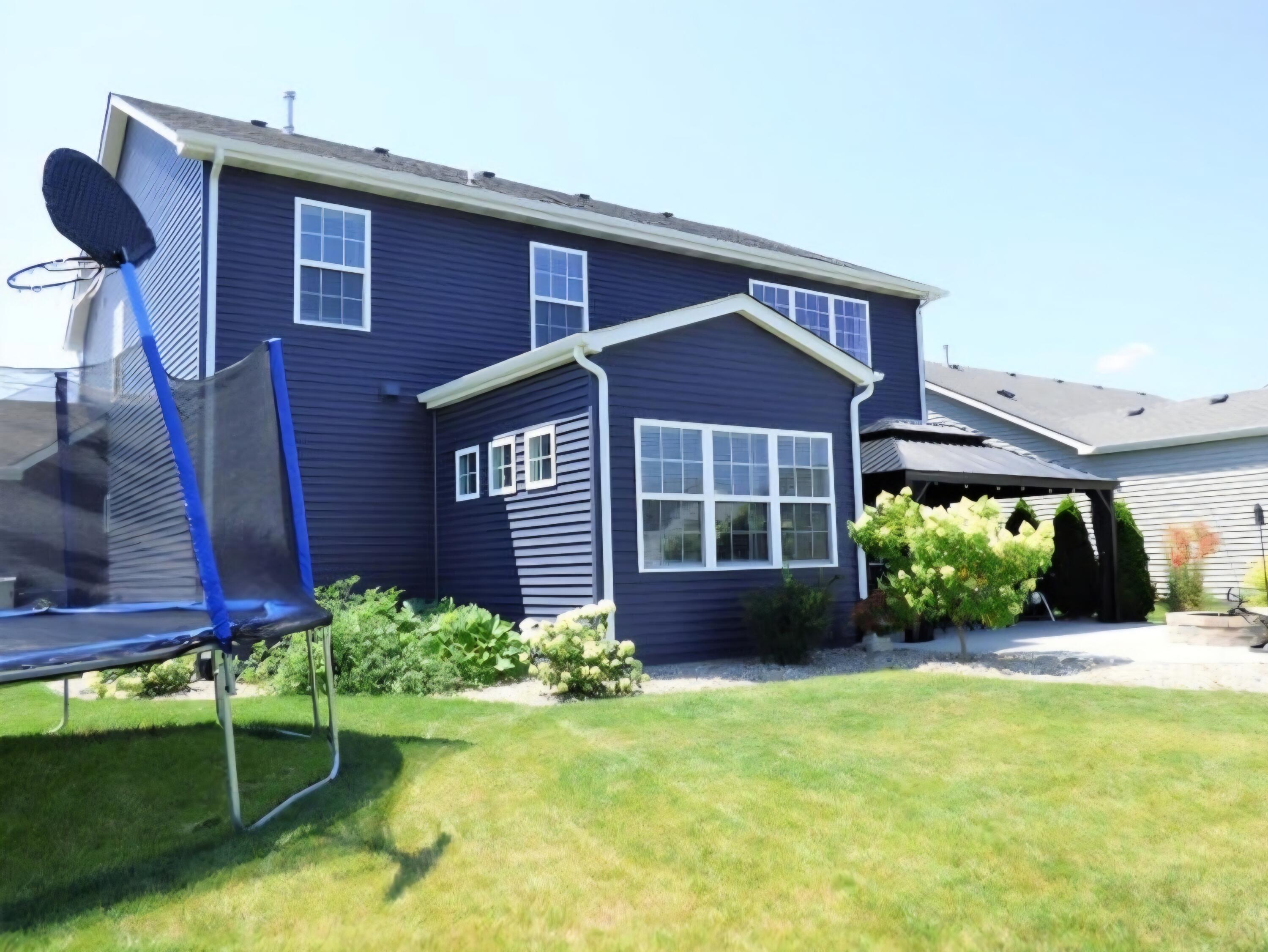 636 East 119th Place Crown Point, IN 46307 - Photo 31 of 35 front view of a house with a yard