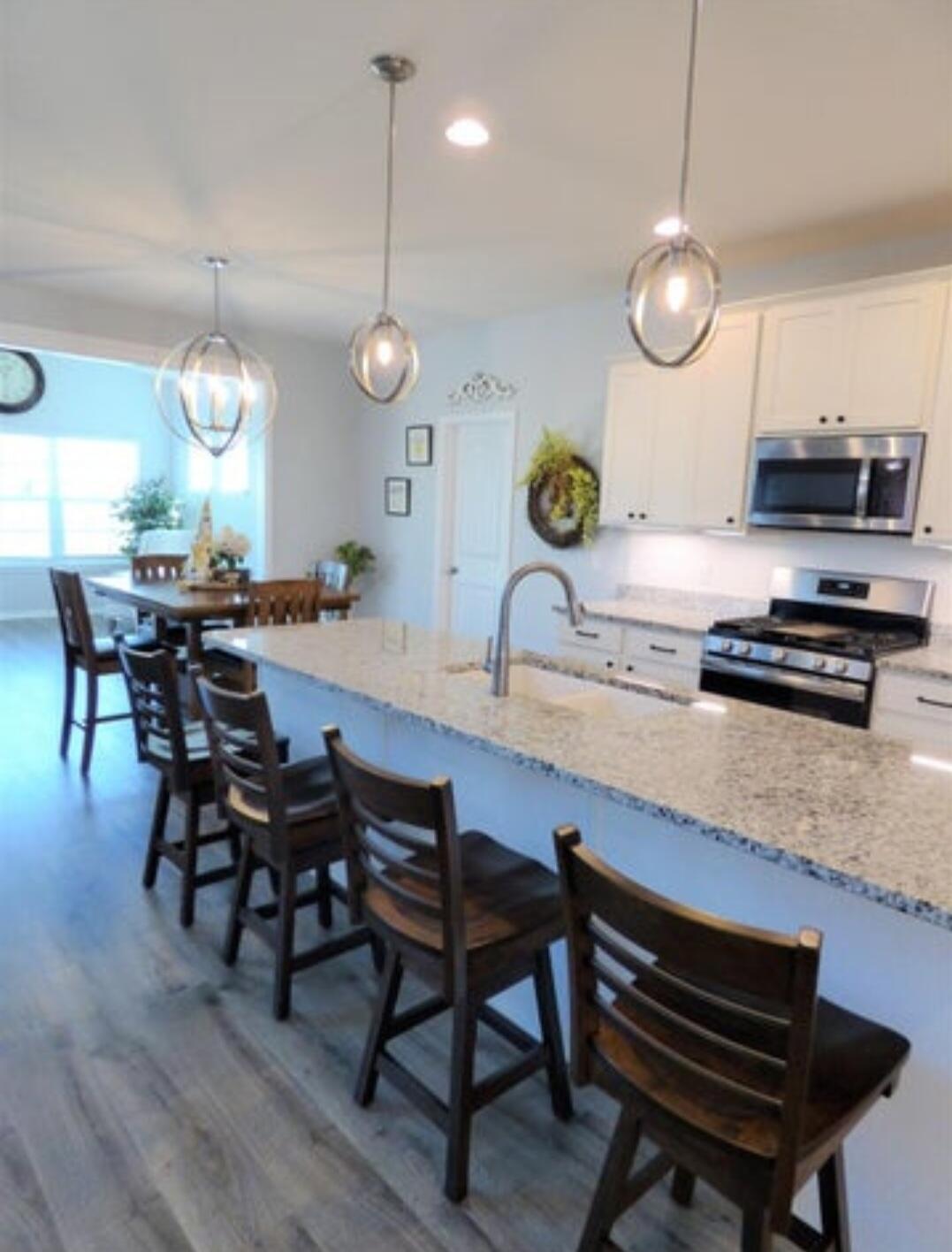 636 East 119th Place Crown Point, IN 46307 - Photo 5 of 35 a view of a dining room and chairs