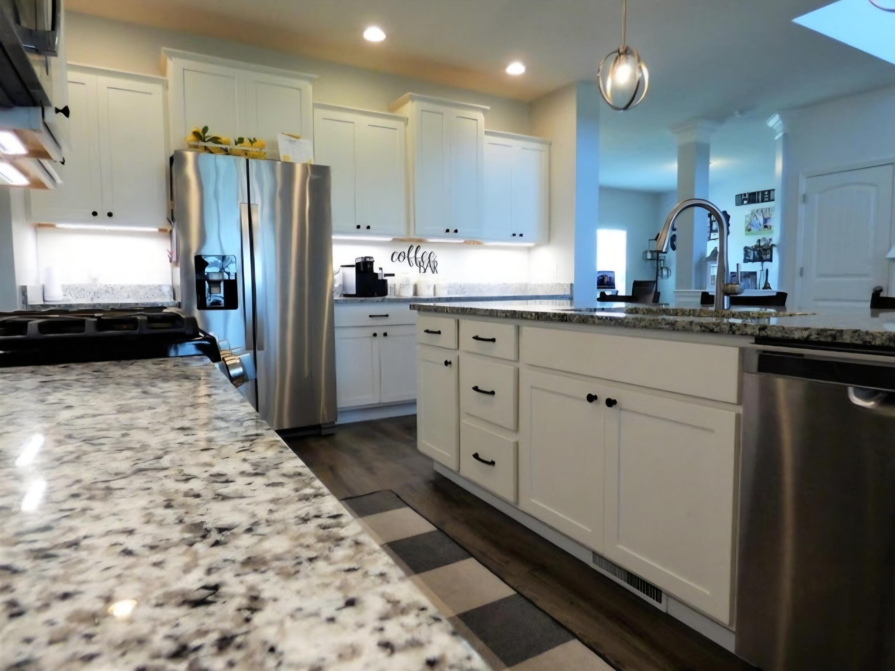 636 East 119th Place Crown Point, IN 46307 - Photo 9 of 35 a kitchen with stainless steel appliances a refrigerator sink and cabinets