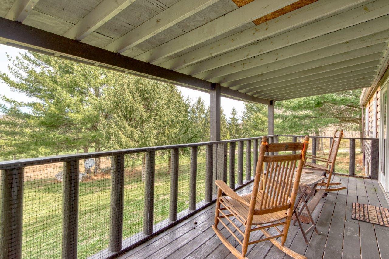 1696 Green Valley Road Peterstown, WV 24963 - Photo 129 of 132 a view of a two chairs in the balcony
