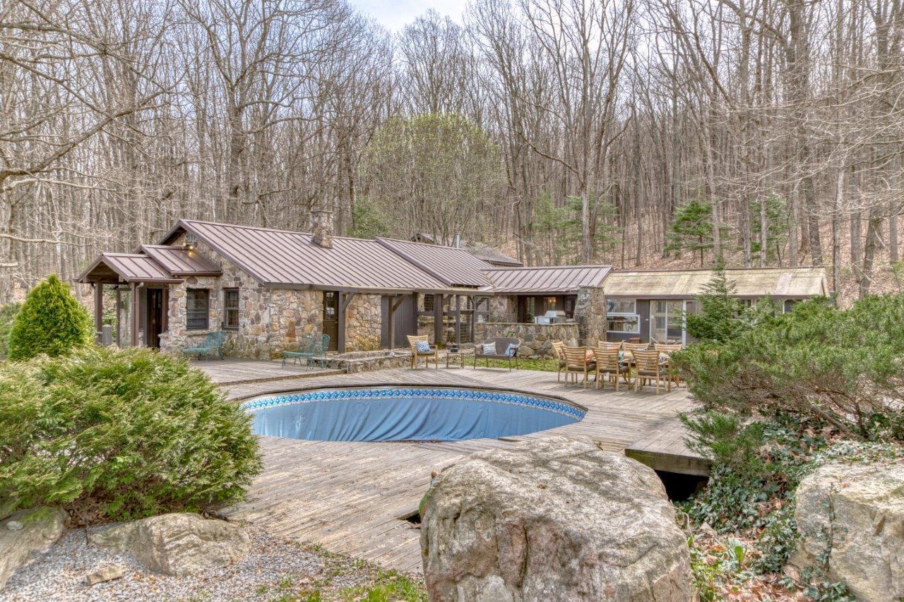 1696 Green Valley Road Peterstown, WV 24963 - Photo 20 of 132 a front view of house with yard and outdoor seating