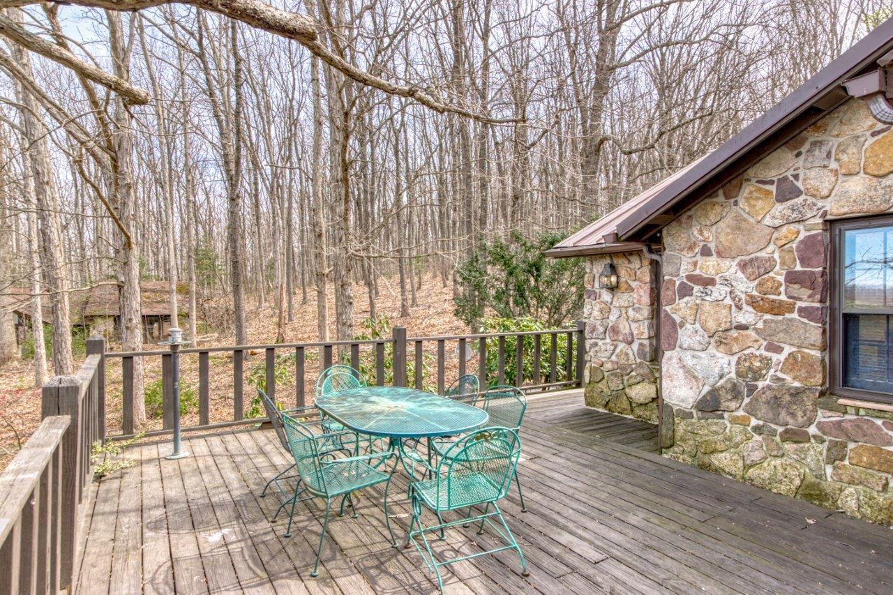 1696 Green Valley Road Peterstown, WV 24963 - Photo 24 of 132 a view of a chairs and table on the wooden floor