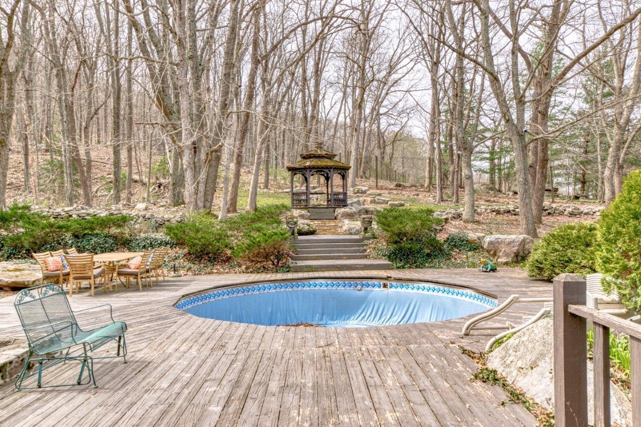 1696 Green Valley Road Peterstown, WV 24963 - Photo 25 of 132 a swimming pool with outdoor seating and yard