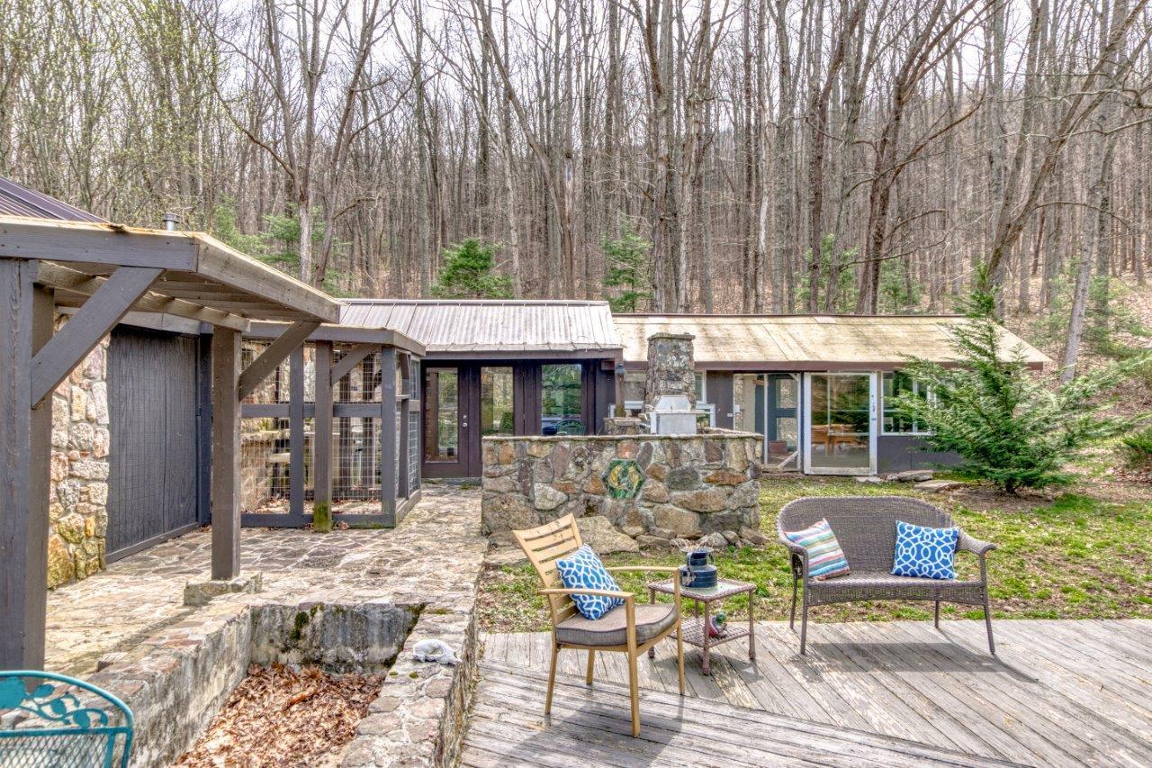 1696 Green Valley Road Peterstown, WV 24963 - Photo 27 of 132 a view of a dinning table and chairs in patio