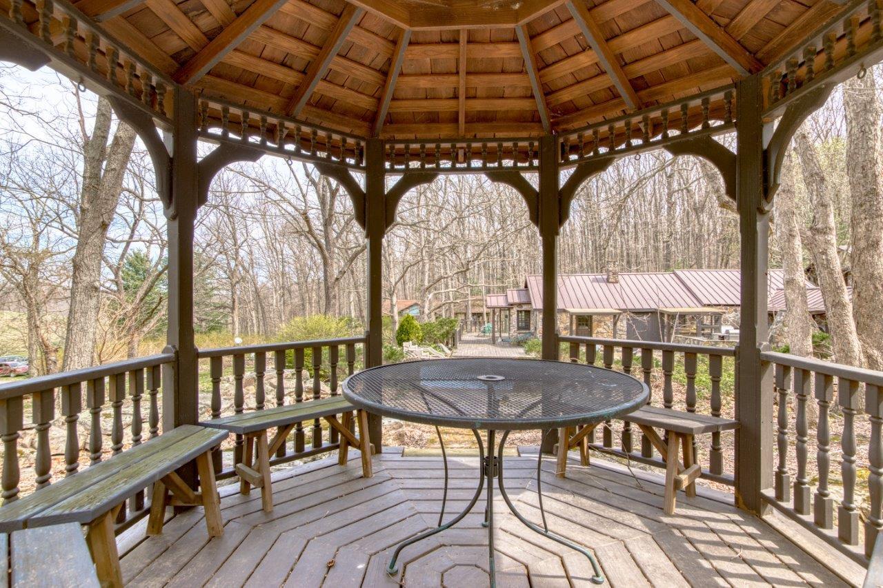 1696 Green Valley Road Peterstown, WV 24963 - Photo 35 of 132 a view of a chairs and table in the patio