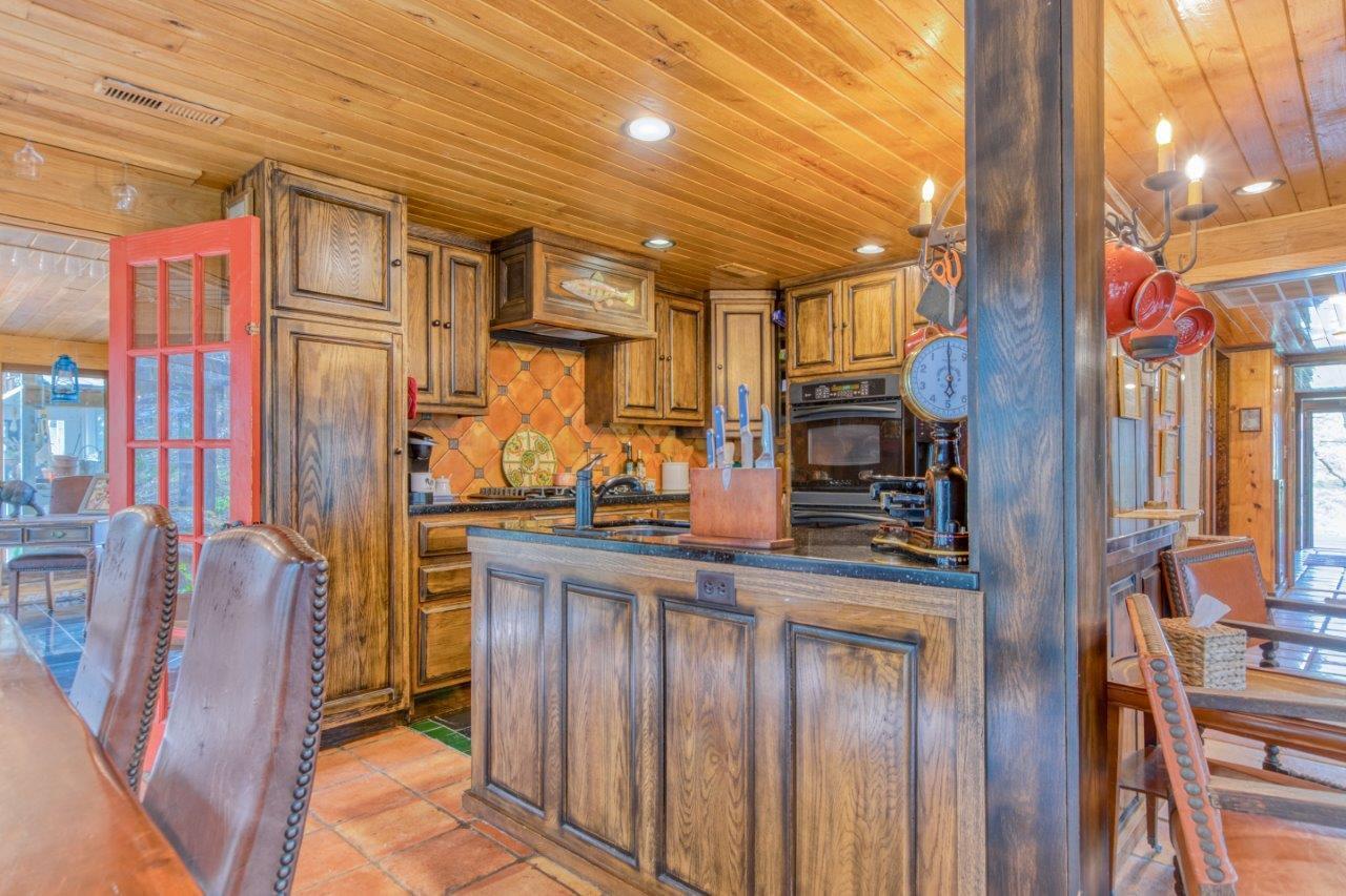 1696 Green Valley Road Peterstown, WV 24963 - Photo 48 of 132 a kitchen with stainless steel appliances granite countertop a refrigerator and a stove