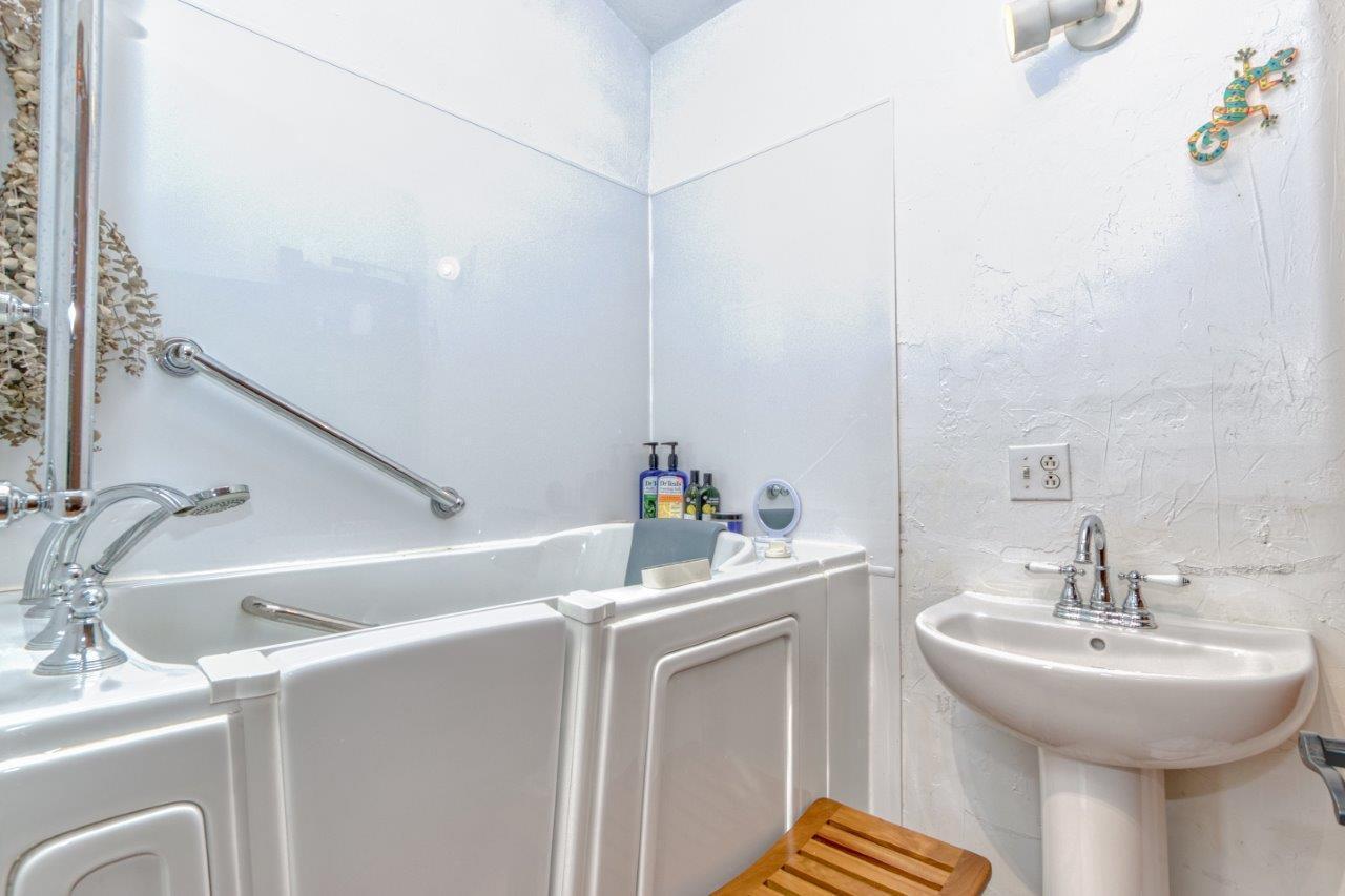1696 Green Valley Road Peterstown, WV 24963 - Photo 59 of 132 a bathroom with a sink and a toilet