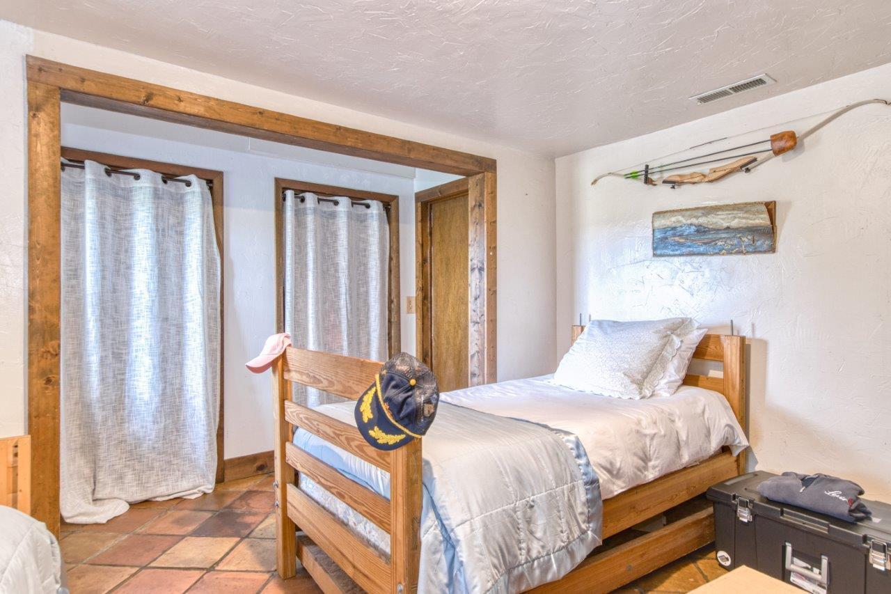 1696 Green Valley Road Peterstown, WV 24963 - Photo 64 of 132 a bedroom with a bed and a window