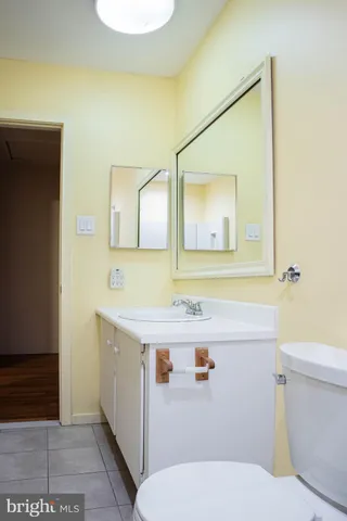 a bathroom with a sink and a window