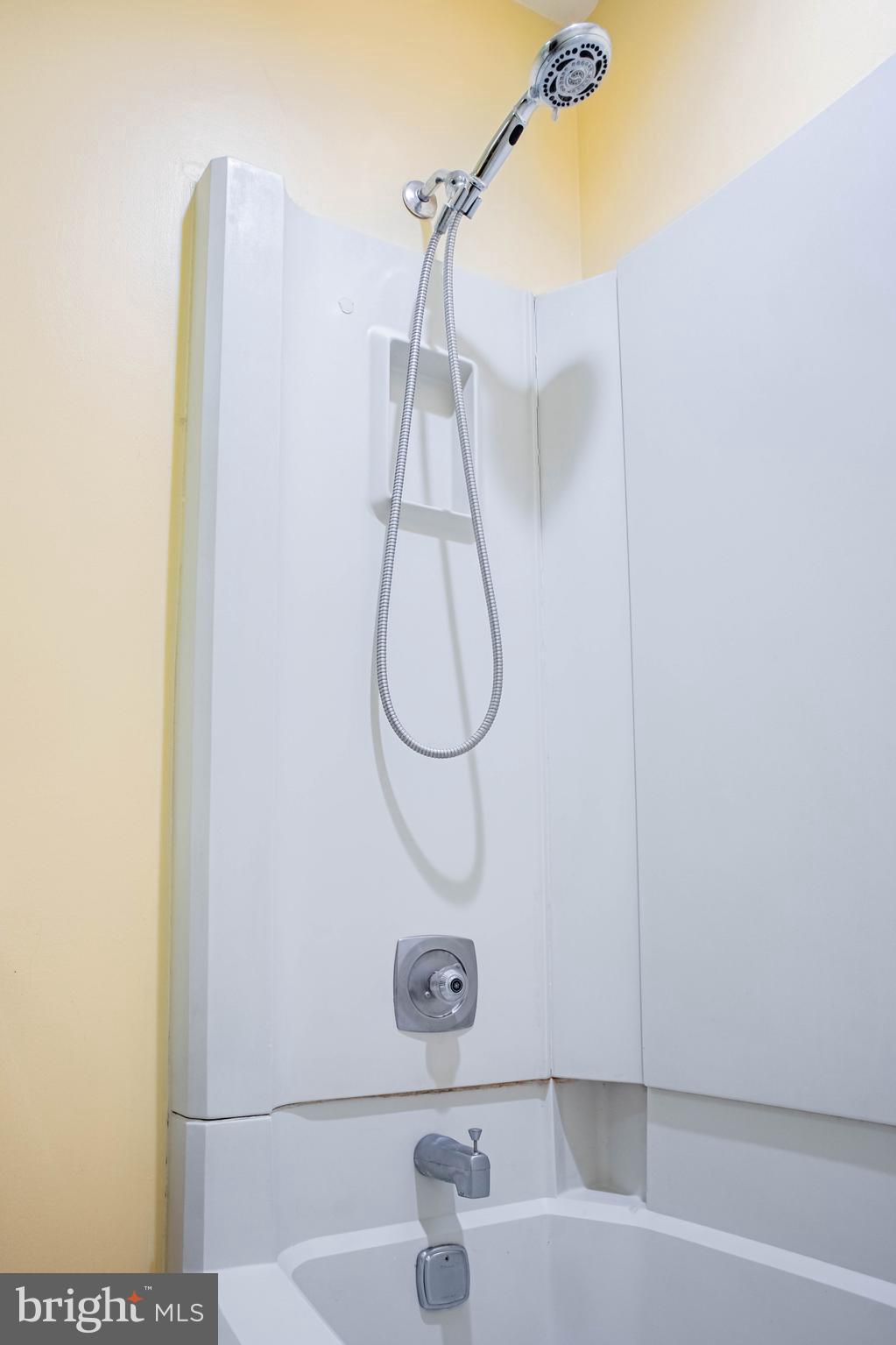 906 Locust Street Philadelphia, PA 19107 - Photo 13 of 46 a bathroom with a sink and a window