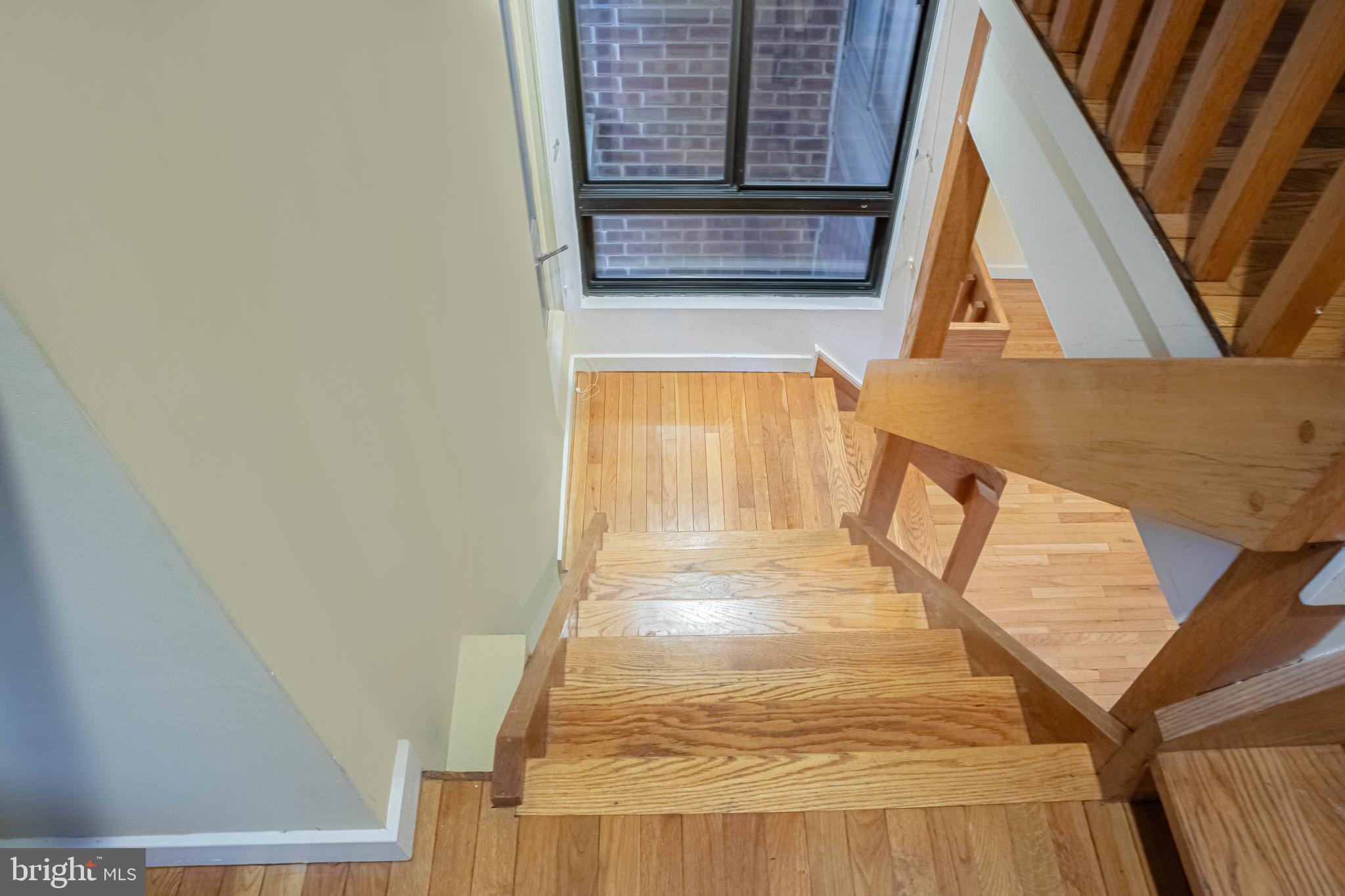 906 Locust Street Philadelphia, PA 19107 - Photo 25 of 46 a view of balcony with wooden floor and door