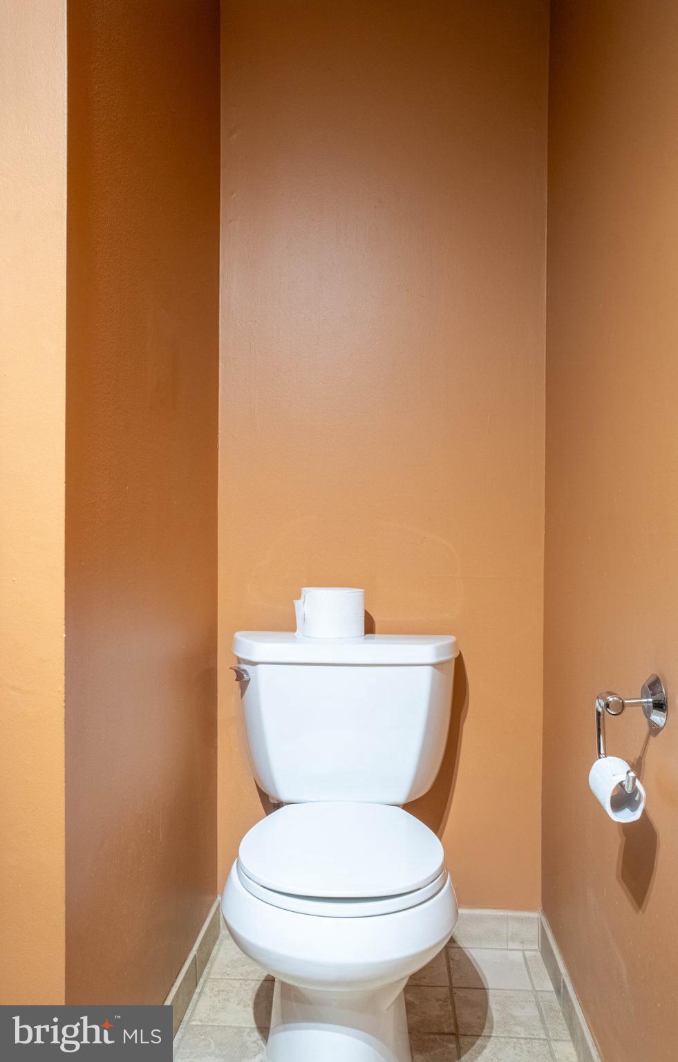 906 Locust Street Philadelphia, PA 19107 - Photo 29 of 46 a white toilet sitting next to a white wall