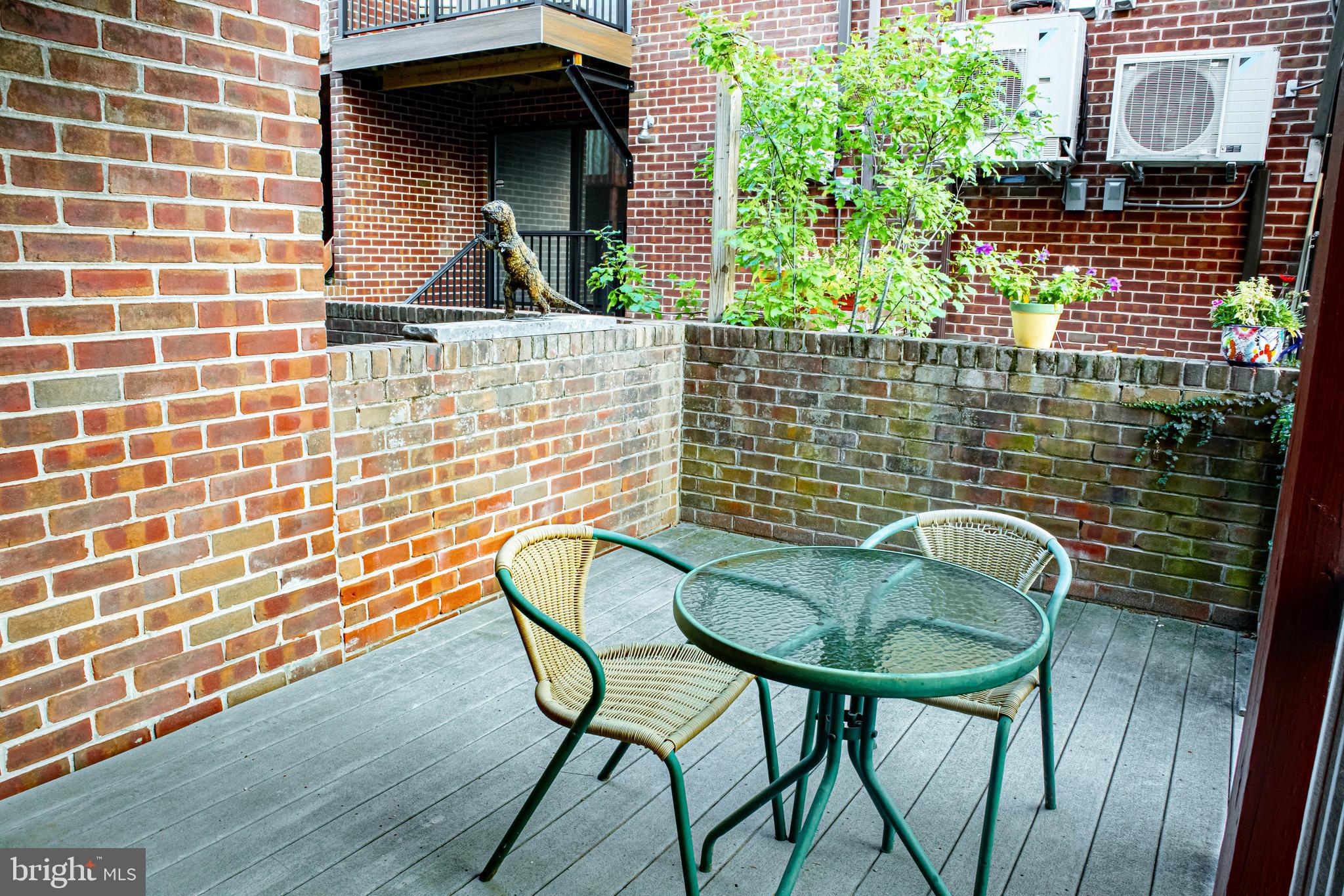 906 Locust Street Philadelphia, PA 19107 - Photo 34 of 46 a bathroom with a sink and mirror