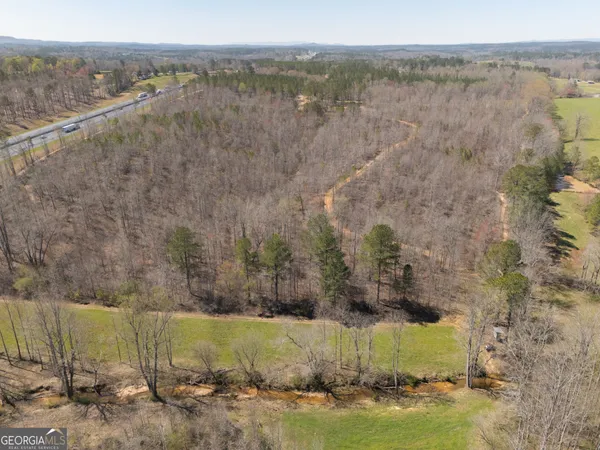 a view of a lake with mountains in the background
