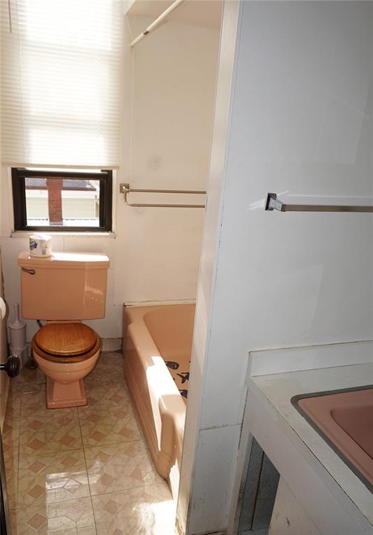 421 Ormsby Avenue Pittsburgh, PA 15210 - Photo 22 of 30 a bathroom with a toilet and a sink