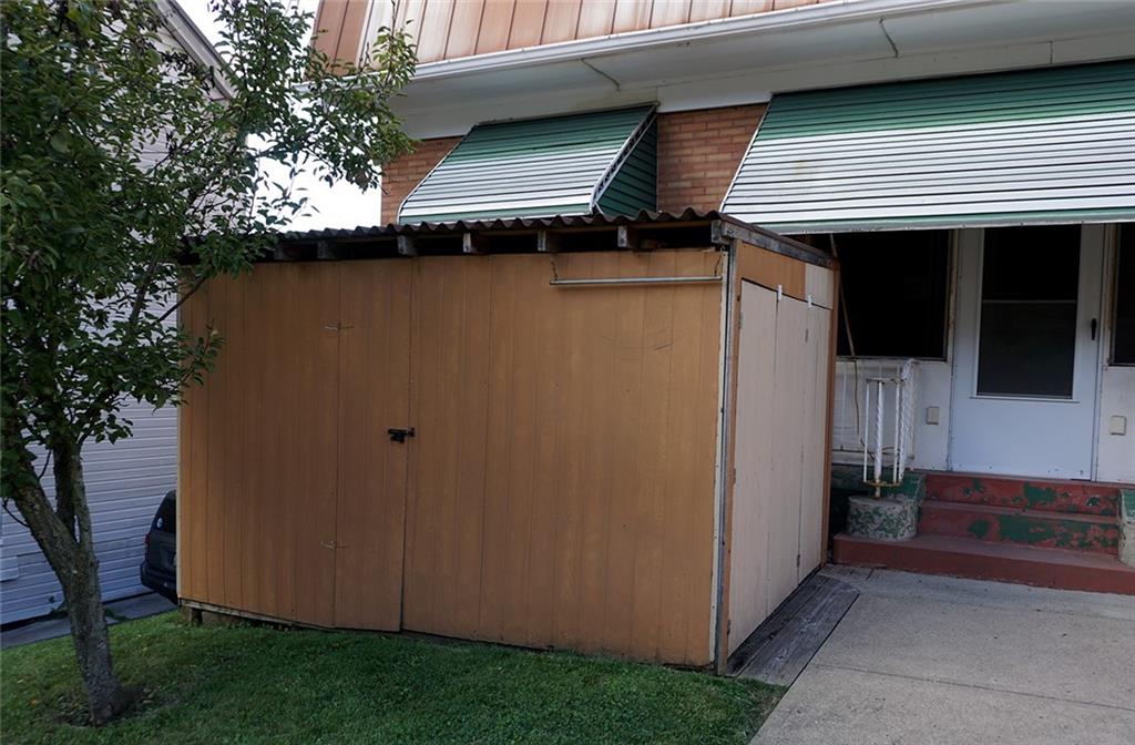 421 Ormsby Avenue Pittsburgh, PA 15210 - Photo 3 of 30 a view of a car garage of the house