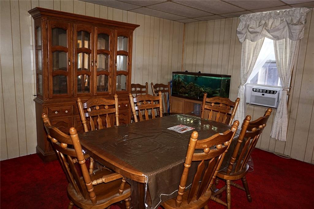 421 Ormsby Avenue Pittsburgh, PA 15210 - Photo 9 of 30 a dining room with furniture and window