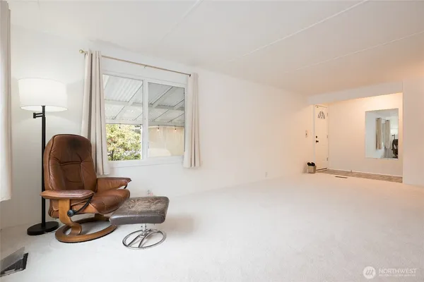 a room with furniture and a window