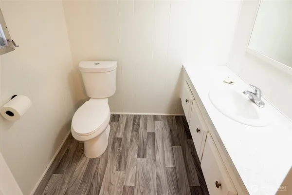 a bathroom with a sink and a toilet