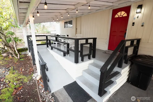 a view of a chairs and table in a patio