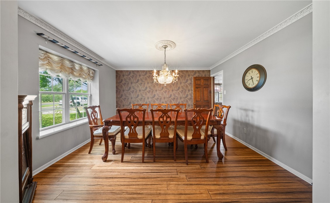 5222 Wooldridge Road Corpus Christi, TX 78413 - Photo 3 of 34 a view of a dining room with furniture window and wooden floor