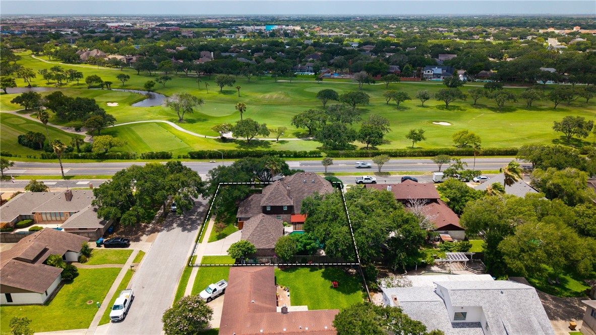 5222 Wooldridge Road Corpus Christi, TX 78413 - Photo 32 of 34 an aerial view of residential houses with outdoor space and swimming pool