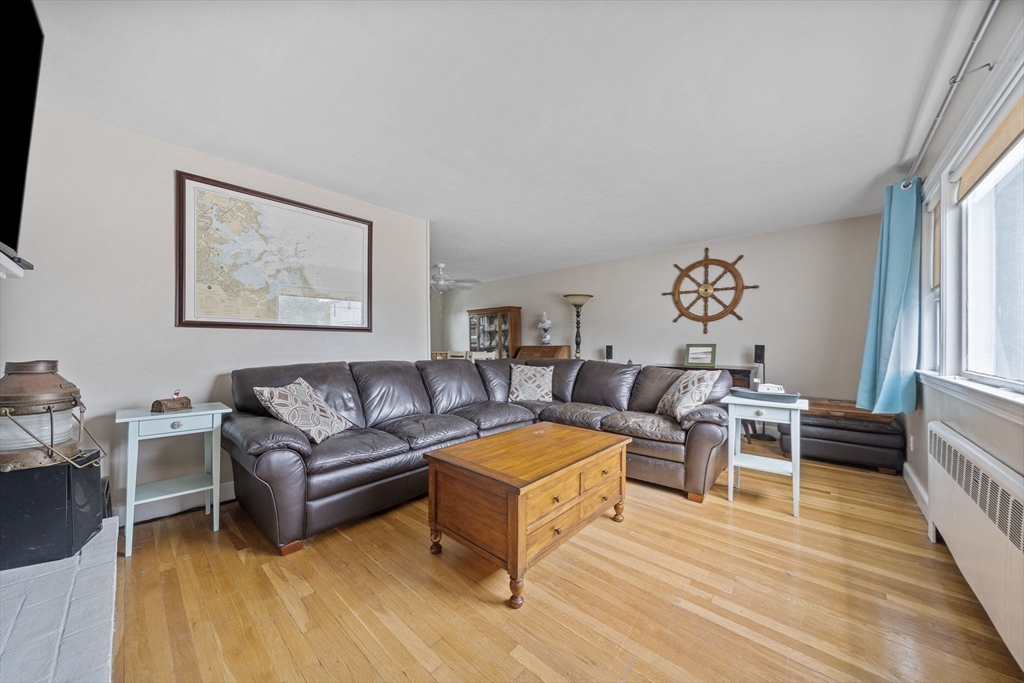 15 D Street Hull, MA 02045 - Photo 5 of 42 a living room with furniture and wooden floor