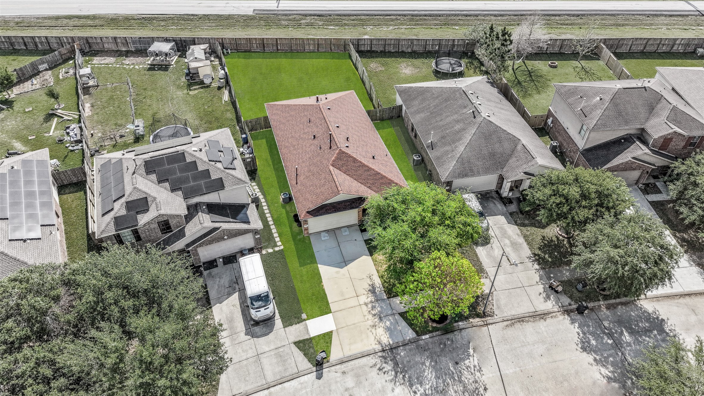 1015 Honeysuckle Vine Drive Rosenberg, TX 77469 - Photo 2 of 29 an aerial view of multiple houses with outdoor space