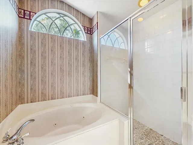 a kitchen with sink cabinets and window